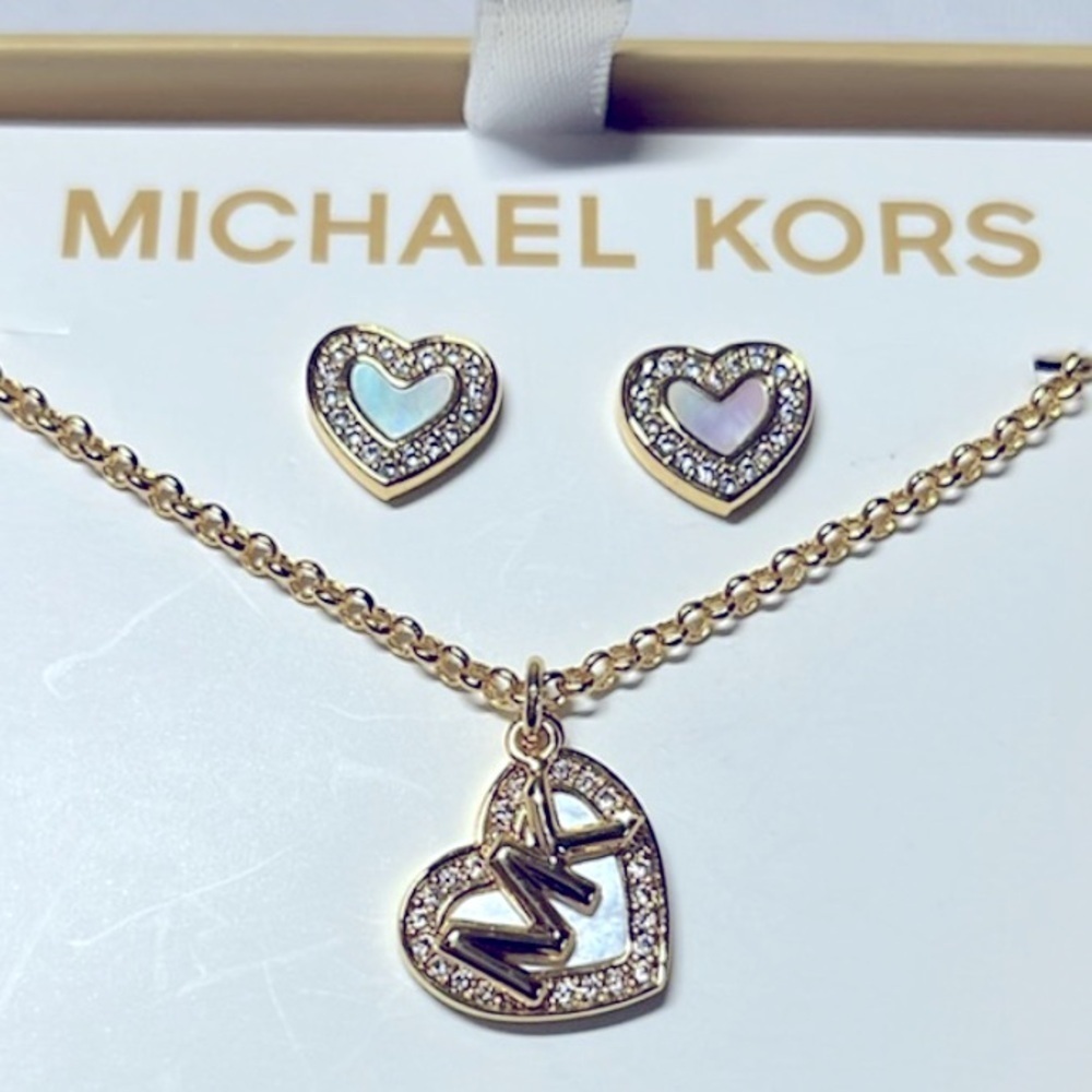 NEW Michael Kors HEART Necklace and Earring set. NWT. 
Gold tone
A Perfect gift!